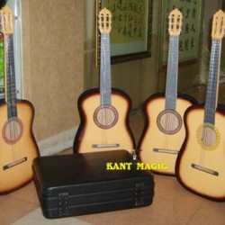 3 APPEARING GUITARS FROM SUITCASE